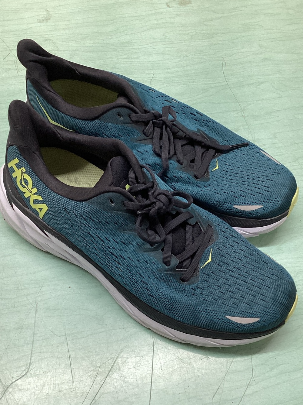 Hoka Men's Teal and Black Running Shoes with Yellow Accents
